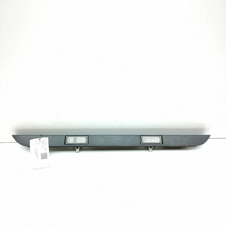 Trunk door license plate light bar 1307272070