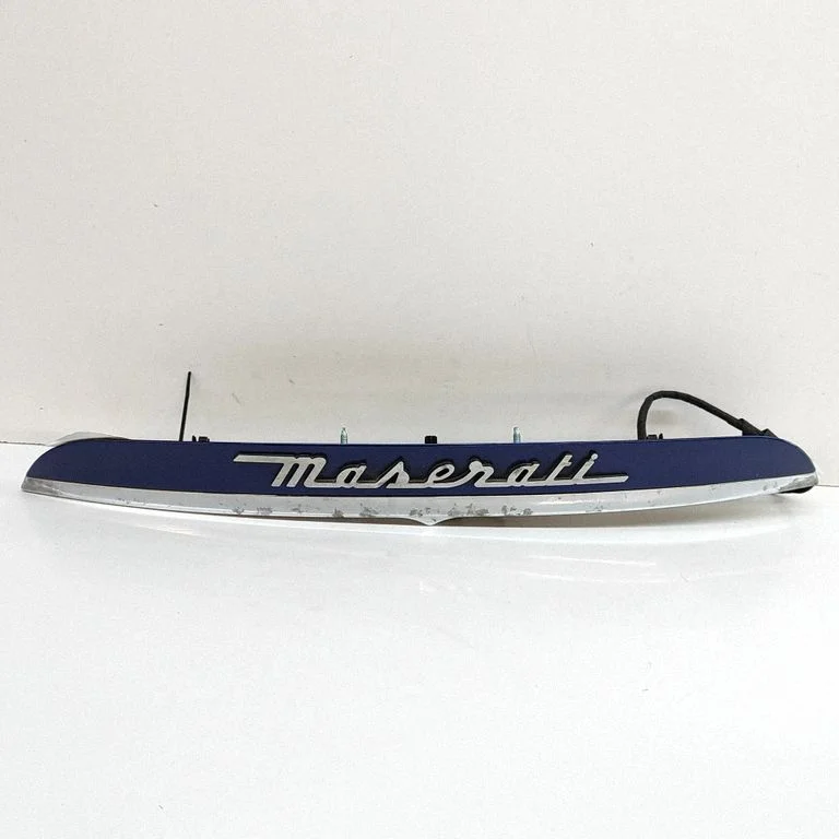 Trunk door license plate light bar 670126338
