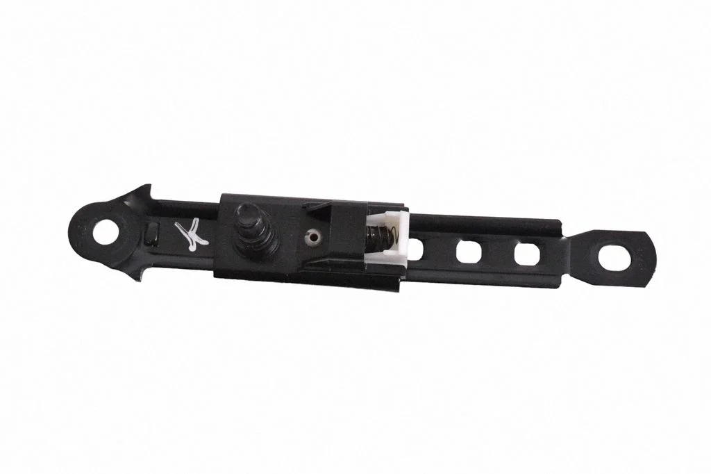 Seat belt adjustment motor – front left