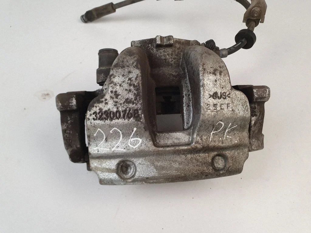 Front brake caliper 32300768