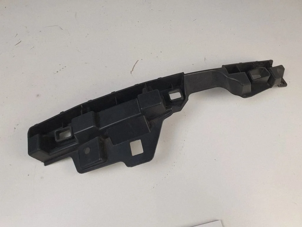 Headlight/headlamp mounting bracket – front left