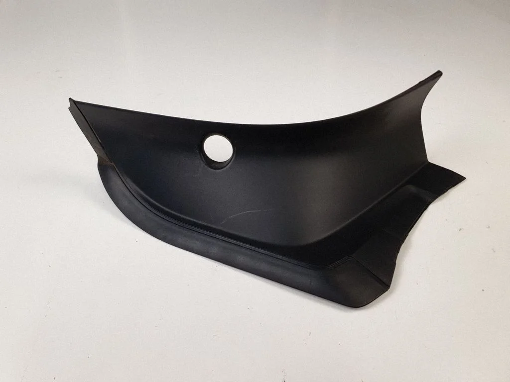Rear/tail light trim molding – left