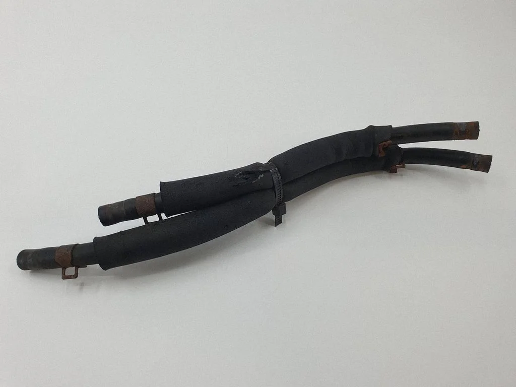 Engine coolant pipe/hose