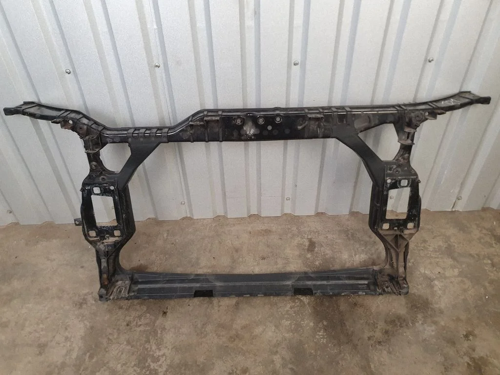 Radiator support slam panel