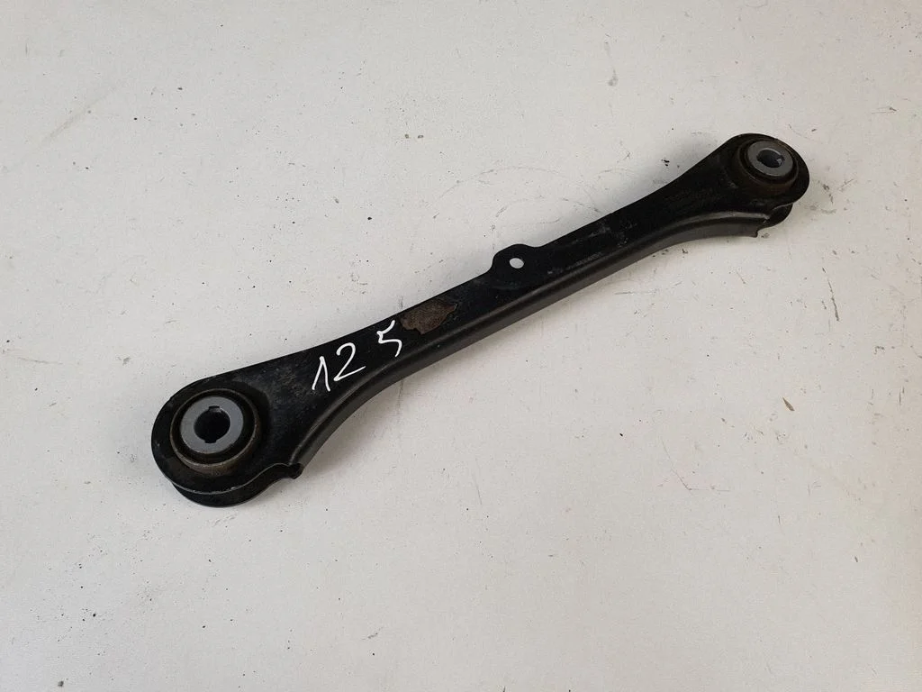 Rear upper control arm/wishbone – left