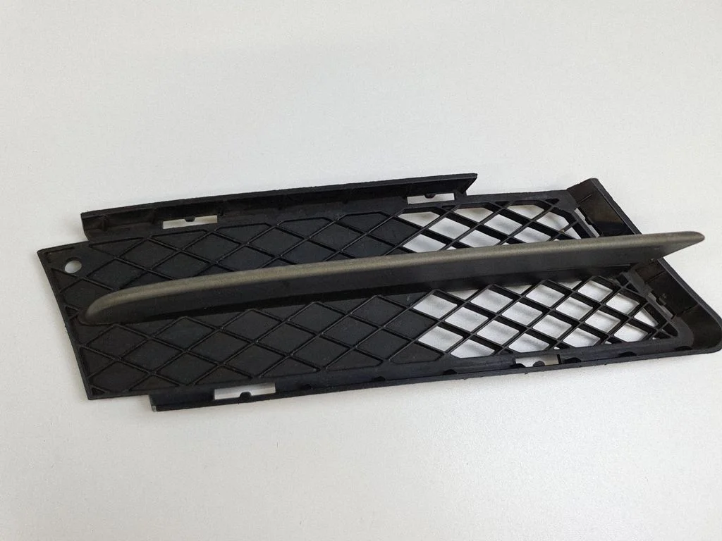 Front bumper lower grill 7134082