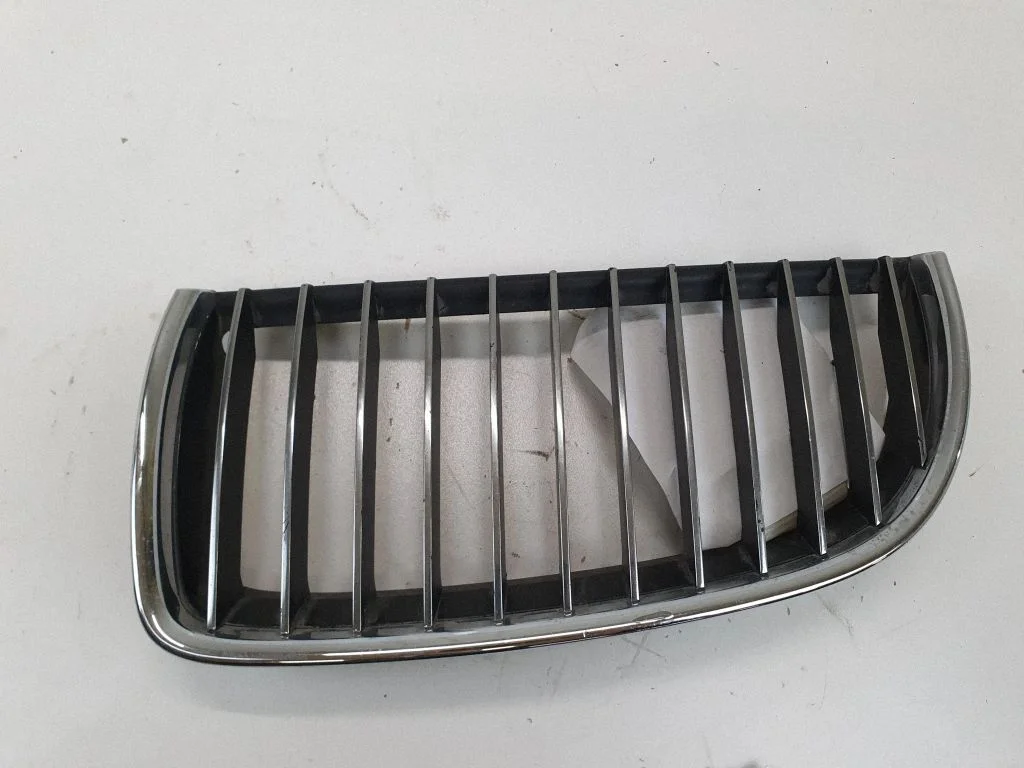 Front bumper upper radiator grill 7120009