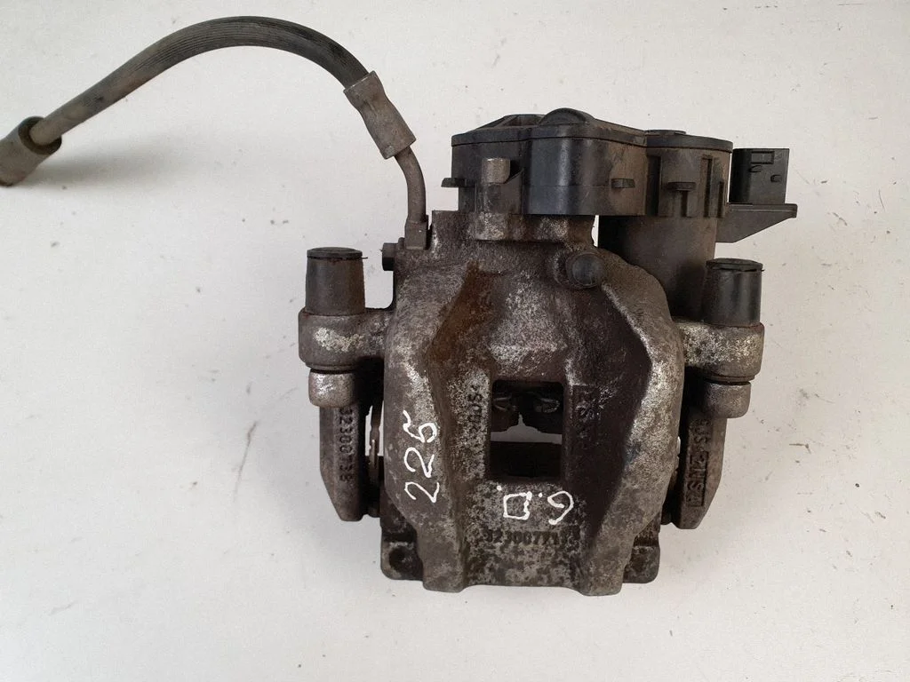 Rear brake caliper P32300717