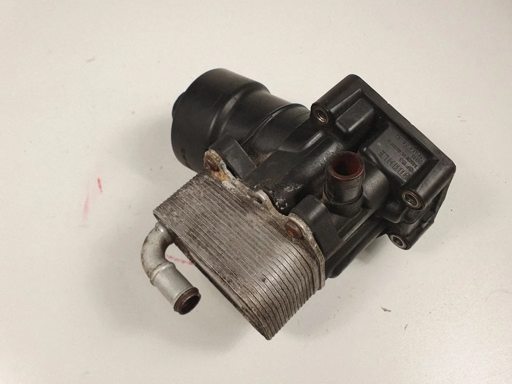Oil filter mounting bracket 03L117021D