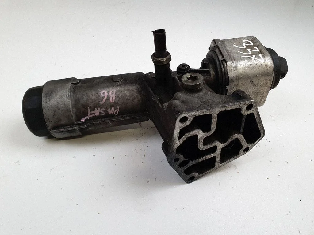 Oil filter mounting bracket 038115389B