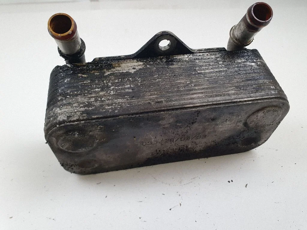 Oil filter mounting bracket – Opel Zafira A (1999-2005)