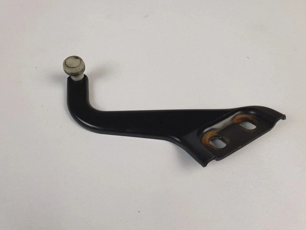 Sliding door upper roller guide/hinge – left
