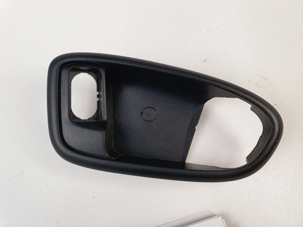 Front door interior handle trim – front right