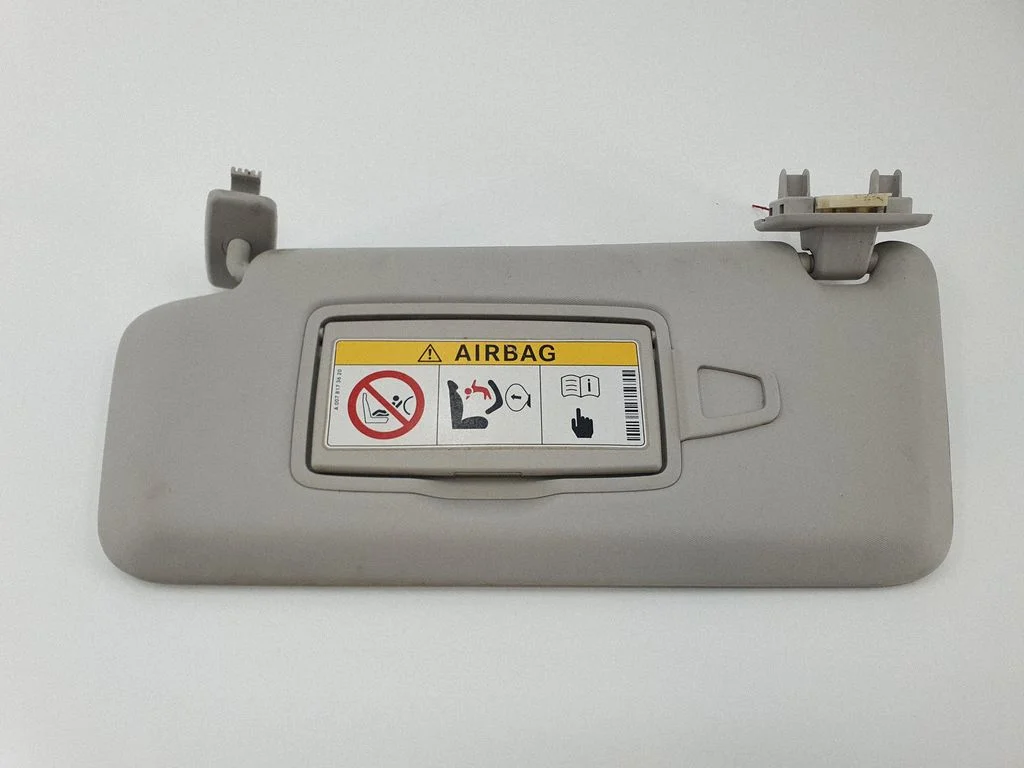 Sun visor – left