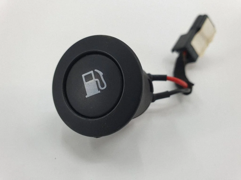 Fuel tank opening switch – KIA Sorento (2010-2014)