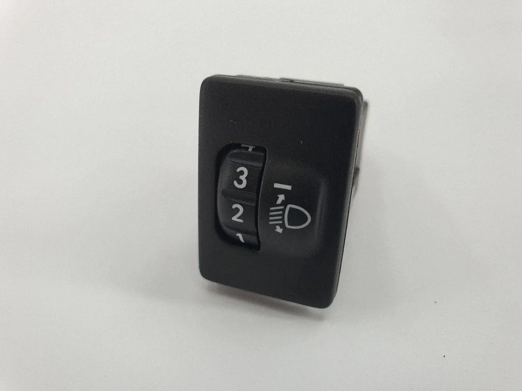 Headlight level height control switch