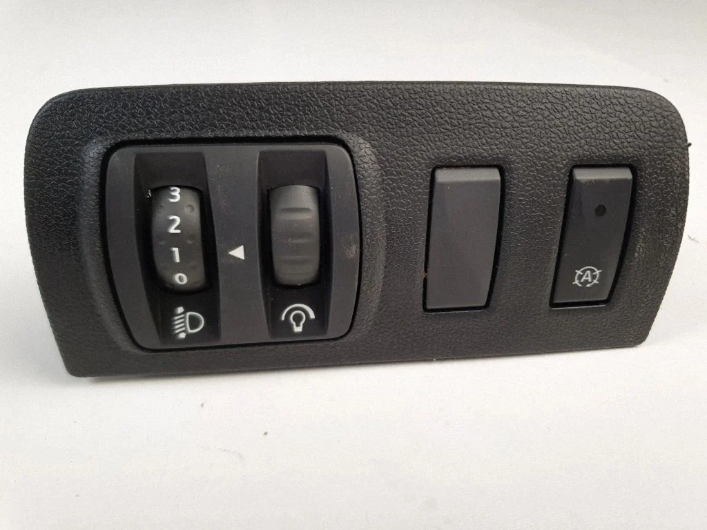 Headlight level height control switch