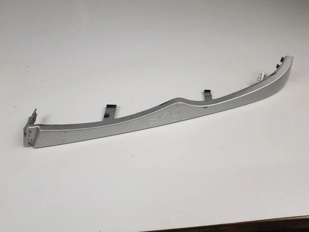 Under headlight/headlamp trim 7030553