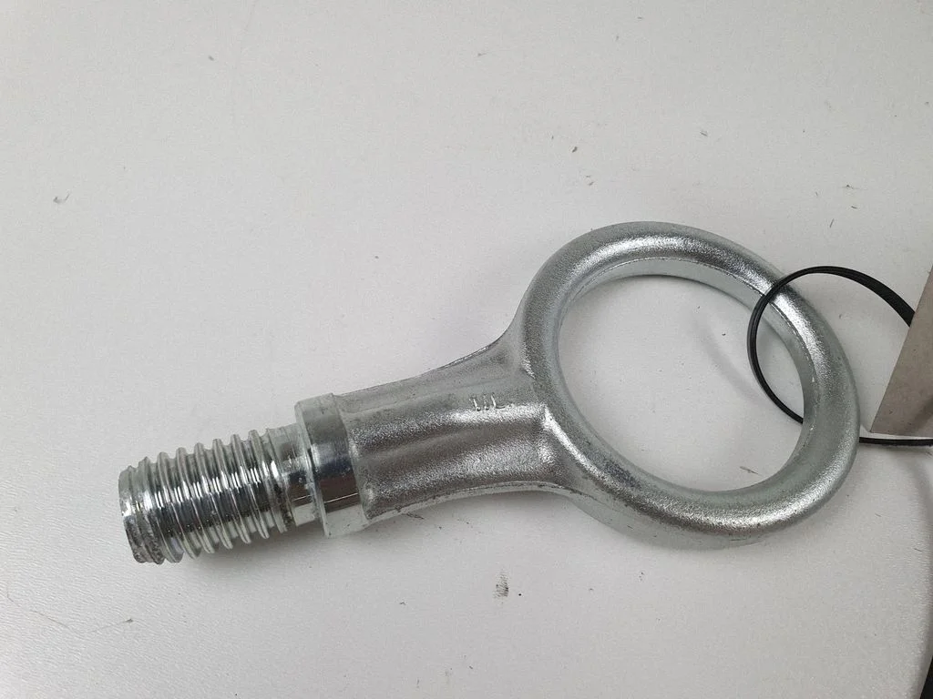 Towing hook eye