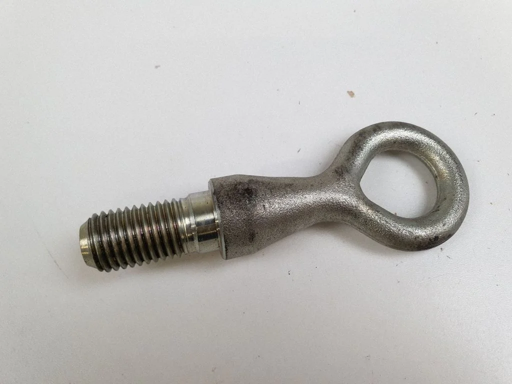 Towing hook eye