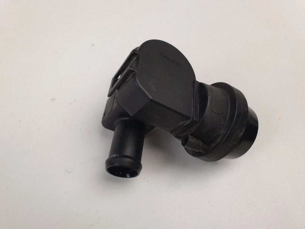Coolant heater control valve