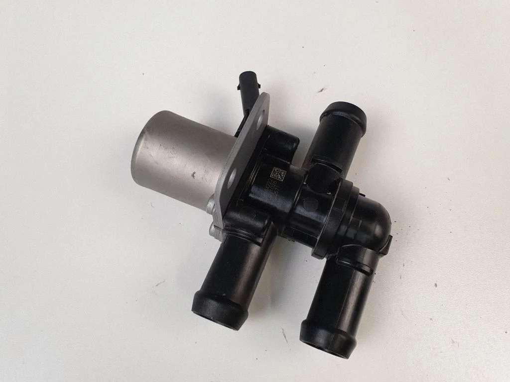 Coolant heater control valve