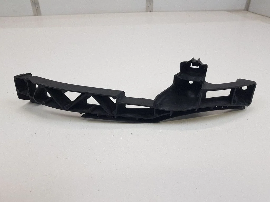 Wspornik reflektora 1Q0807890 – Volkswagen Eos (2006-2010)