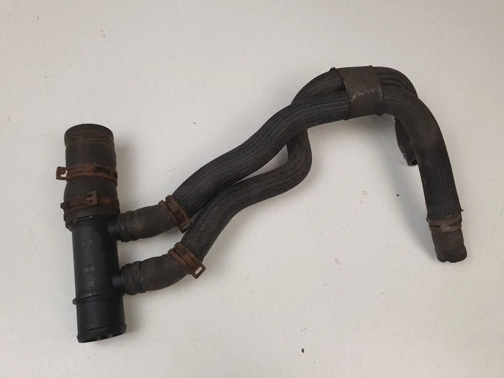 Engine coolant pipe/hose