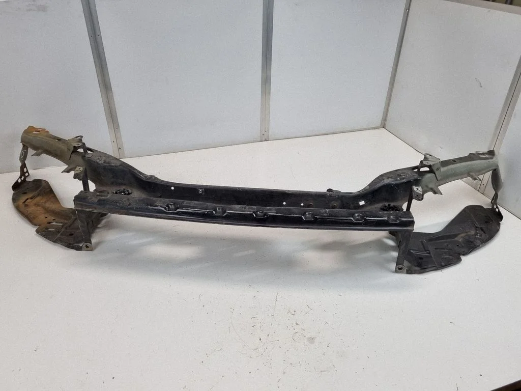 Radiator support slam panel