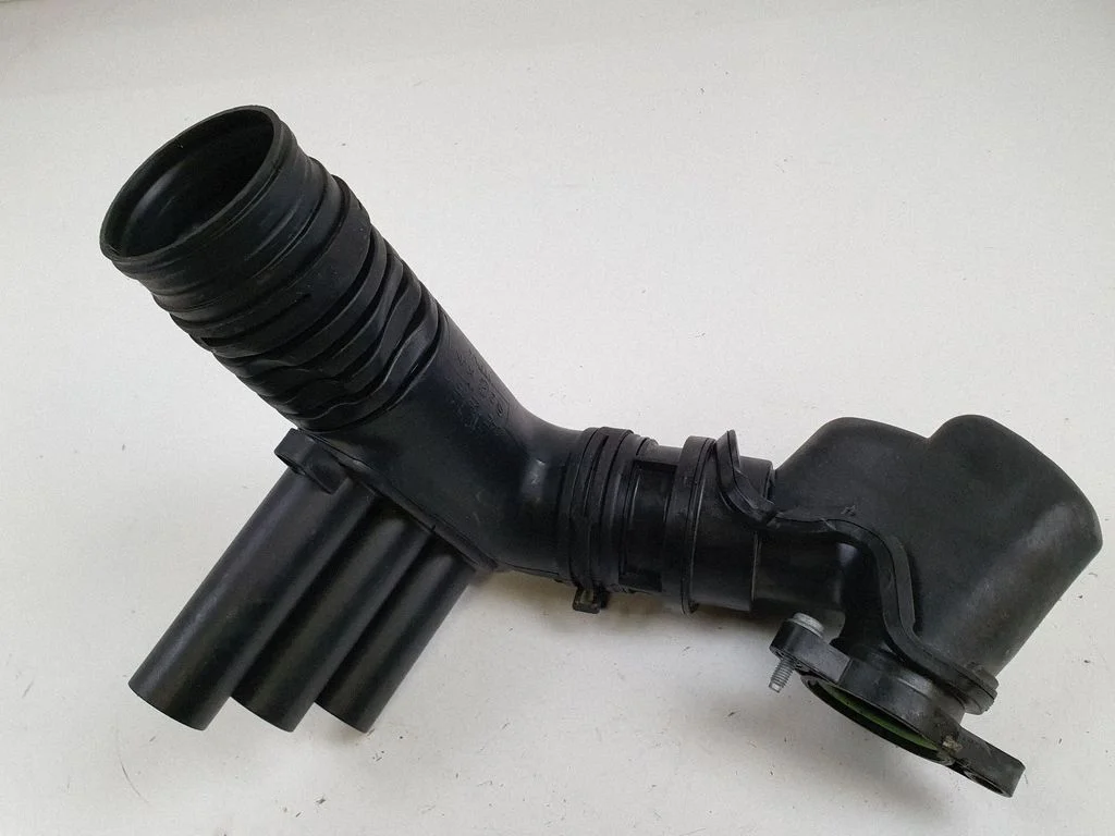 Air intake duct part 04E129656S
