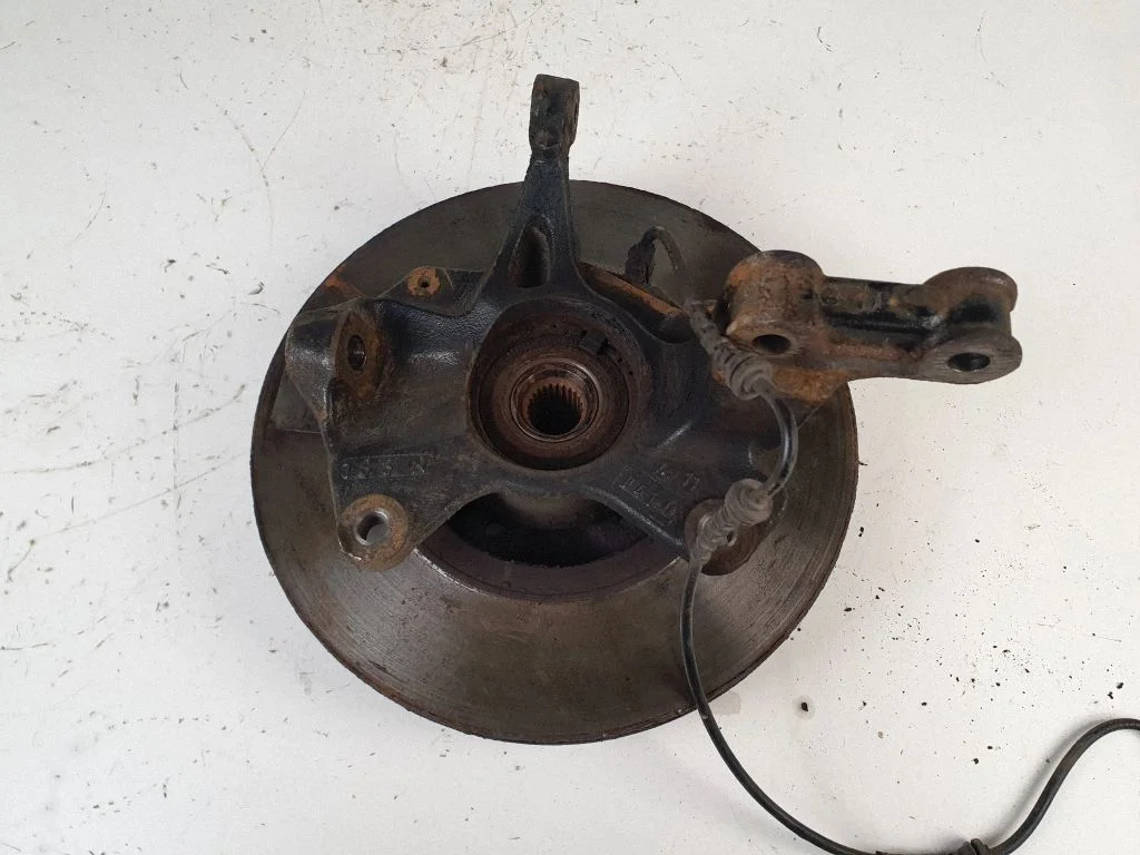 Front wheel hub spindle knuckle – front left