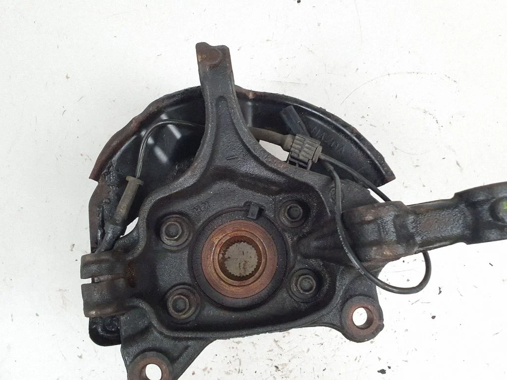 Front wheel hub spindle knuckle – front left