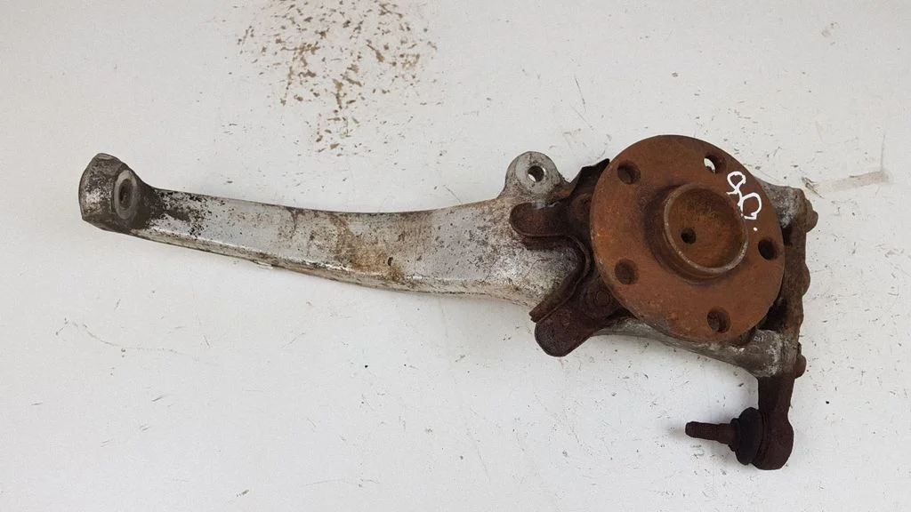 Front wheel hub spindle knuckle – front left
