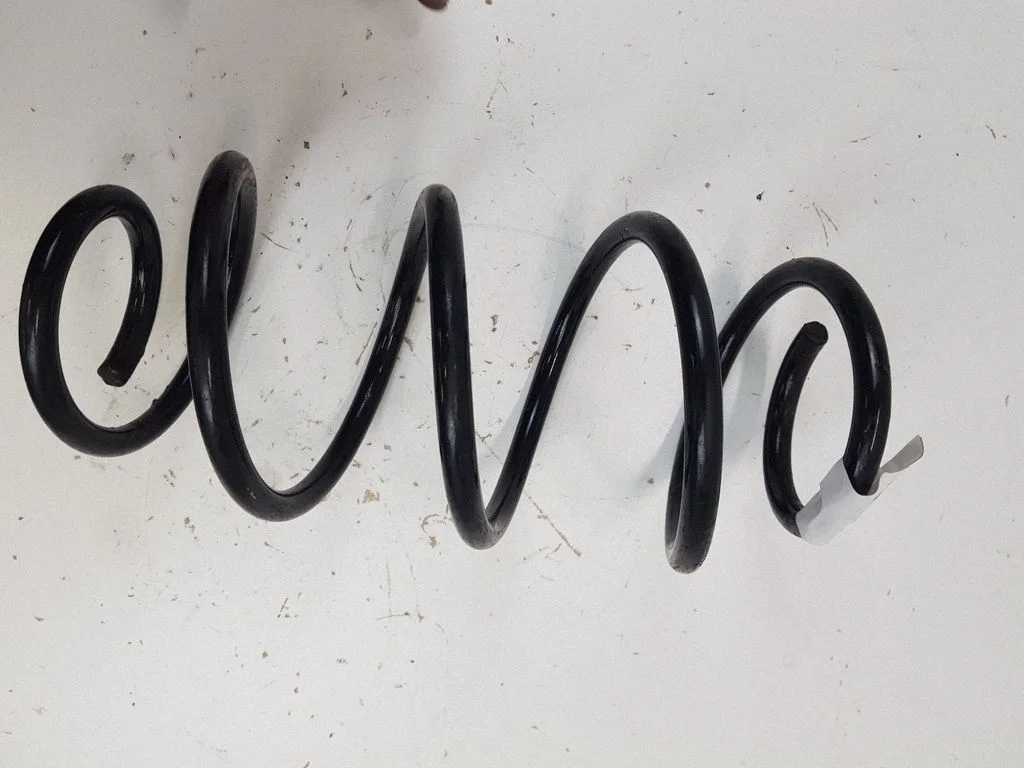 Aizmugurējā spirālatspere