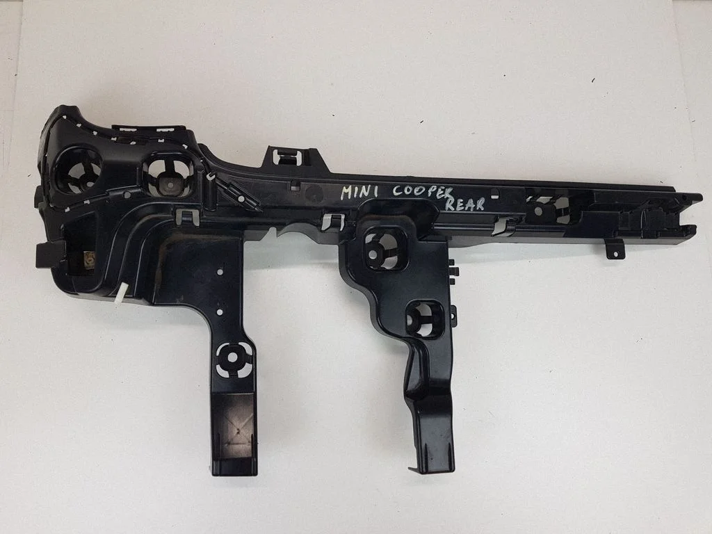 Rear bumper mounting bracket 7411145