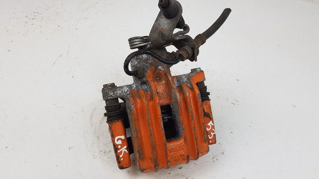 Rear brake caliper – rear left