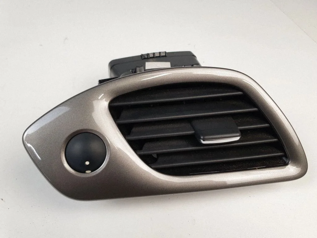 Dashboard side air vent grill/cover trim – front left