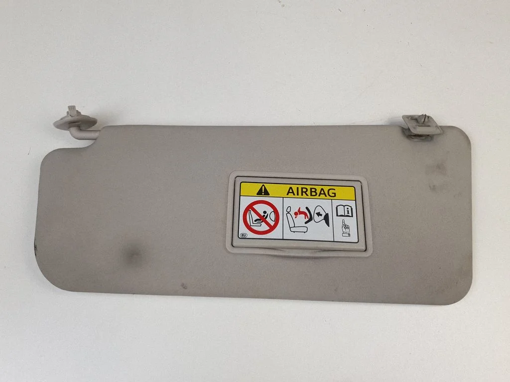 Sun visor – left