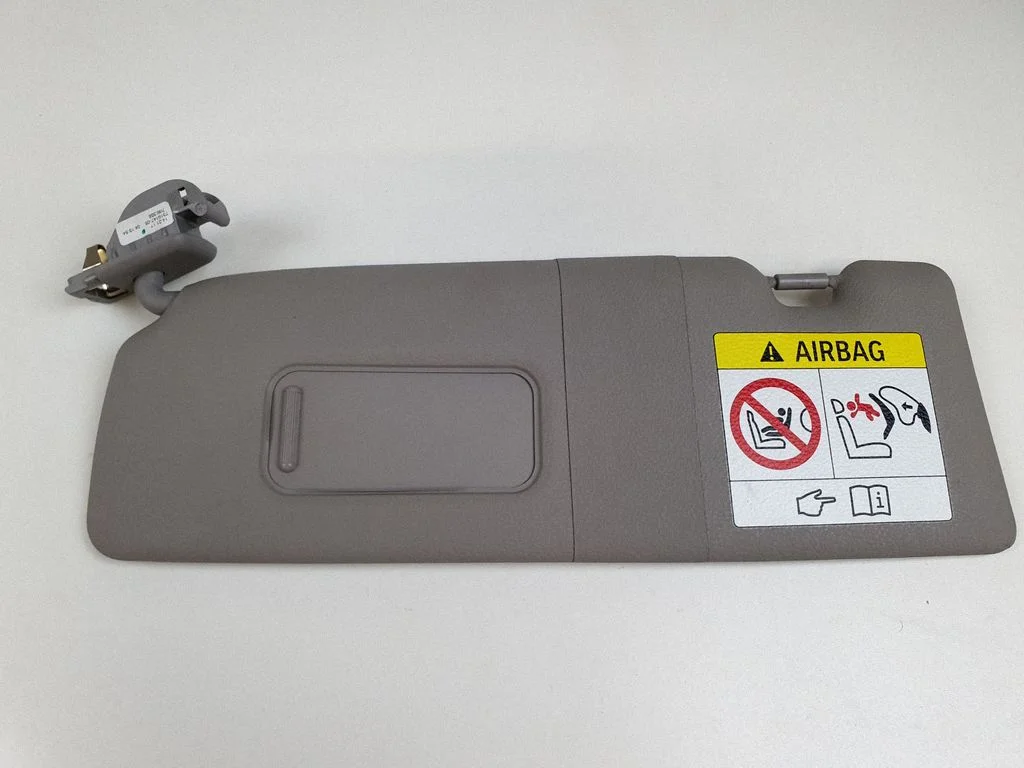 Sun visor – left