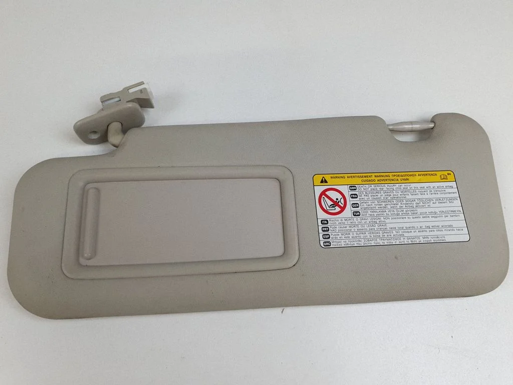 Sun visor – left