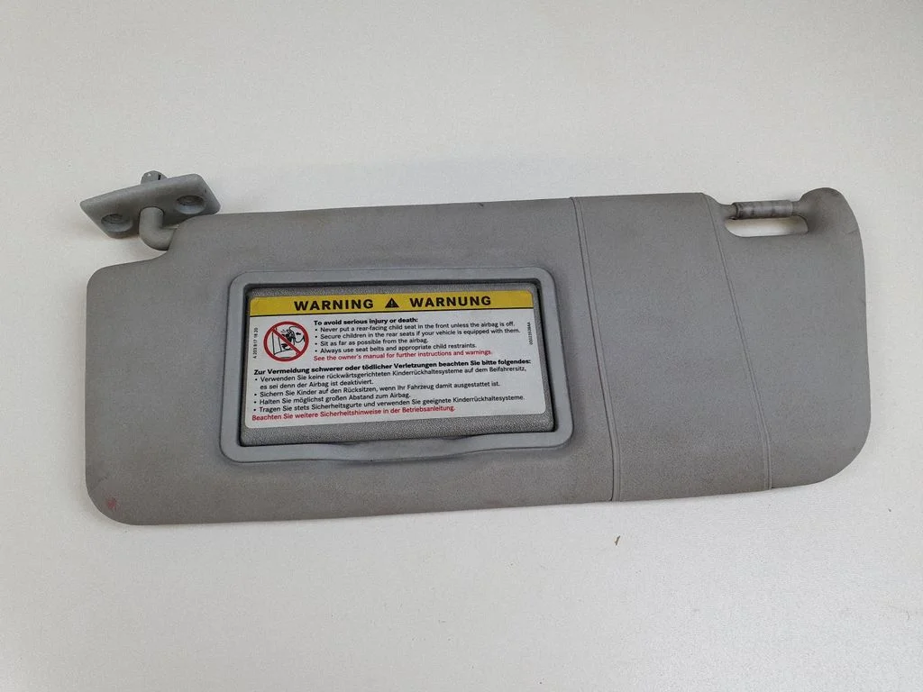 Sun visor – left