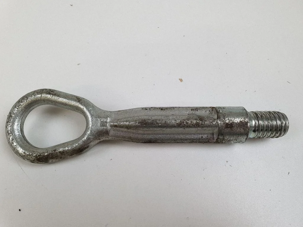 Towing hook eye