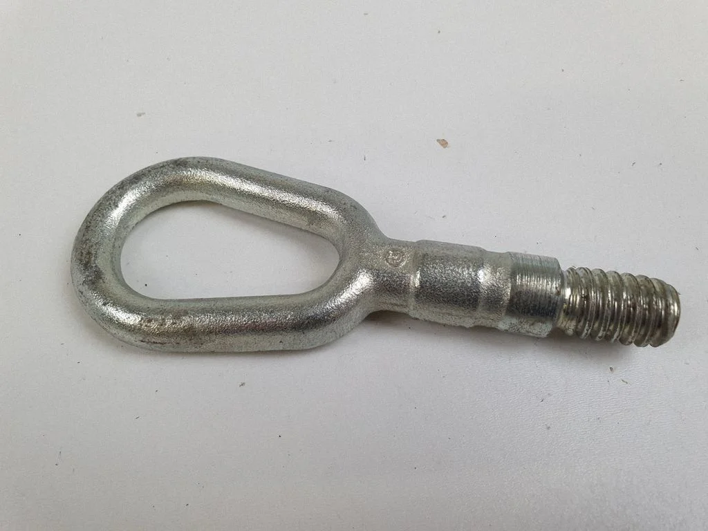 Towing hook eye