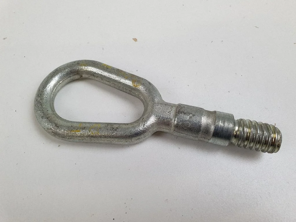 Towing hook eye