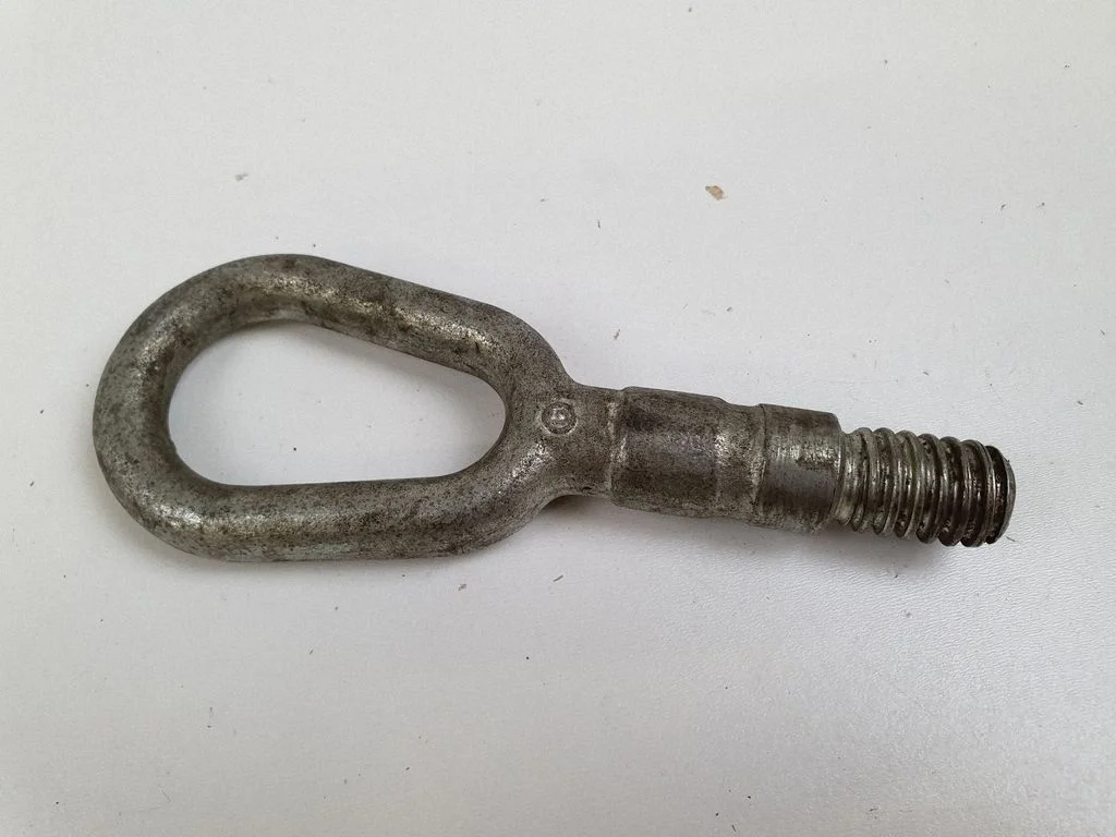 Towing hook eye