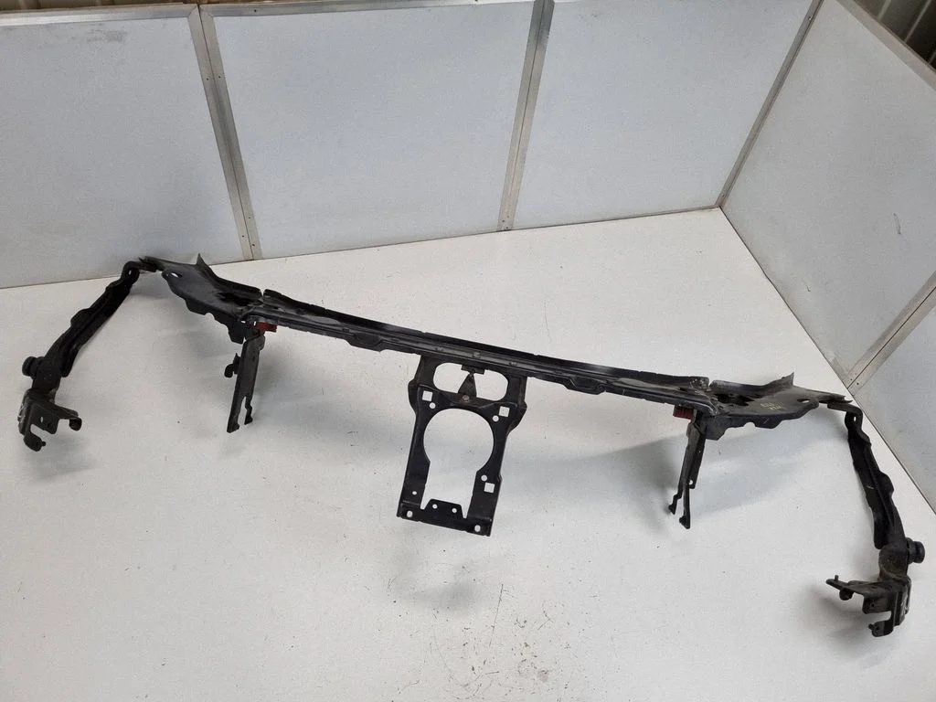 Top upper radiator support slam panel