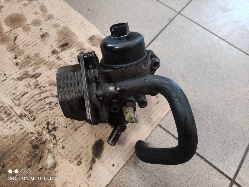 Oil filter mounting bracket 6790978920