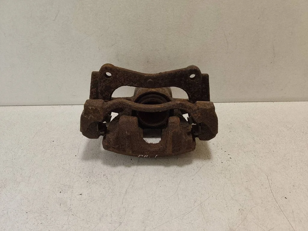 Front brake caliper – left