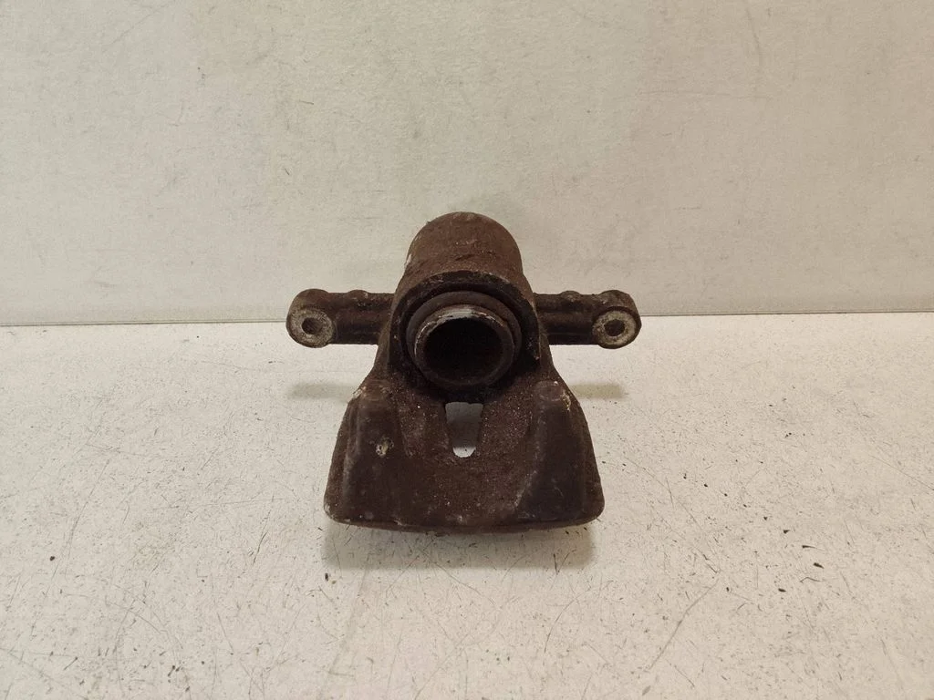 Rear brake caliper – left