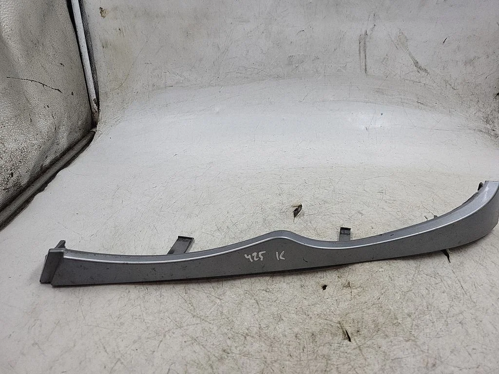 Under headlight/headlamp trim 7030553